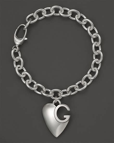 gucci silver charm bracelet.